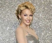 Новые татуировки Кайли Миноуг скрывают любовную тайну