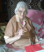 Ветераны войны оставляют на красных лоскутах свои пожелания молодому поколению